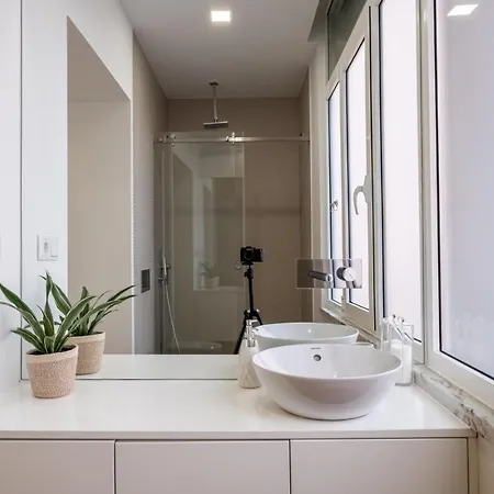 Hola Лиссабон